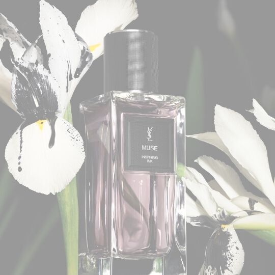 YSL LVDP Muse Eau de Parfum bottle, elegantly presented with striking white and black irises in the background.
