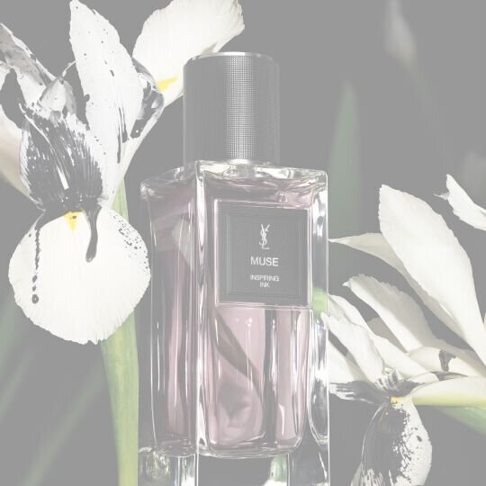 YSL LVDP Muse Eau de Parfum bottle, elegantly presented with striking white and black irises in the background.