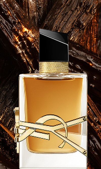 Libre Eau de Parfum Intense bottle with gold YSL logo and metallic platinum finish.