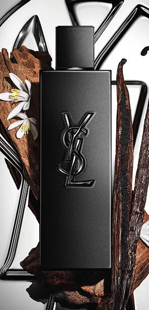 MYSLF Le Parfum matte black bottle by YSL Beauty surrounded by vanilla pods, orange blossom and woods.