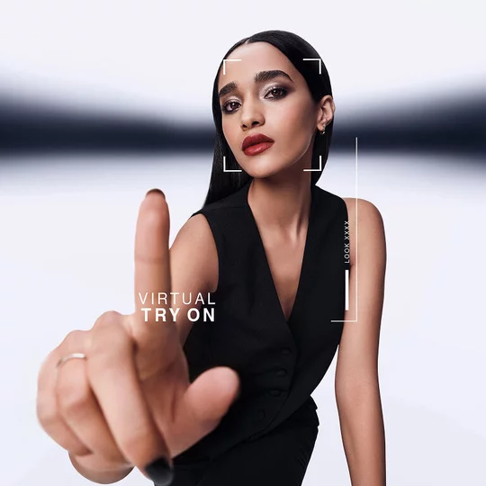 Model using the YSL Virtual Try-On tool to find her perfect foundation match. Digital beauty tech experience.