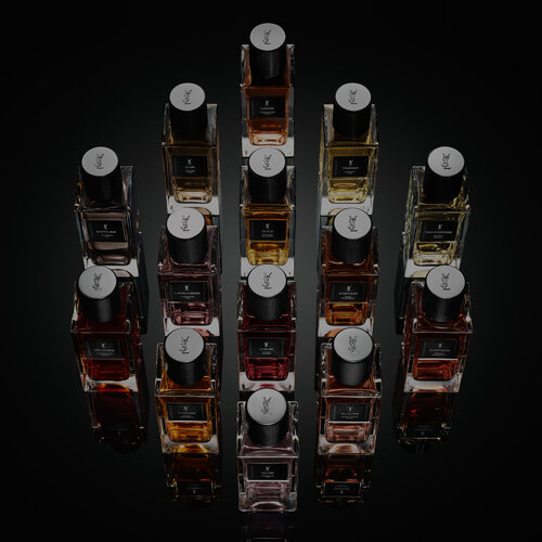 Top view of the complete Le Vestiaire des Parfums collection bottles arranged by YSL Beauty.