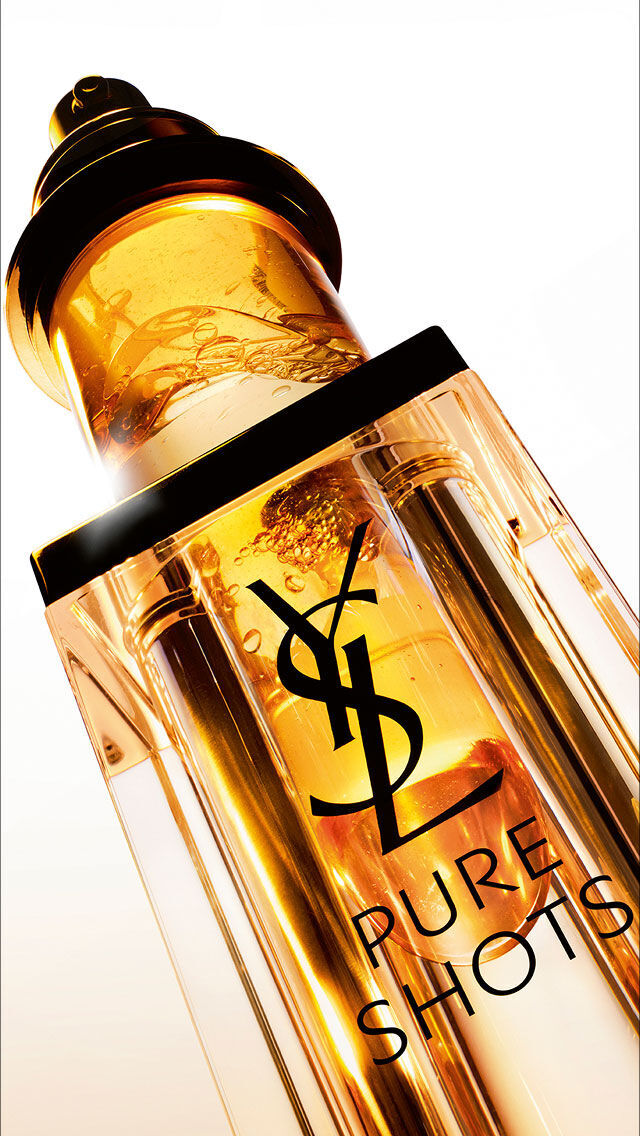 YSL Pure Shots Night Reboot Serum, close-up of the golden serum and dropper, highlighting the luxurious refillable design.