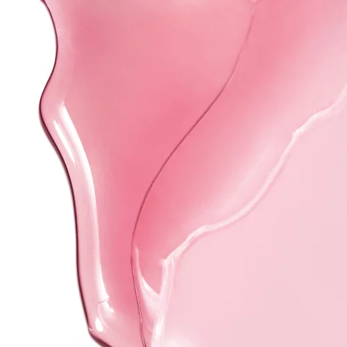 YSL LOVESHINE Candy Glow in shade 1B, a smooth, glossy pink texture with a luminous finish.