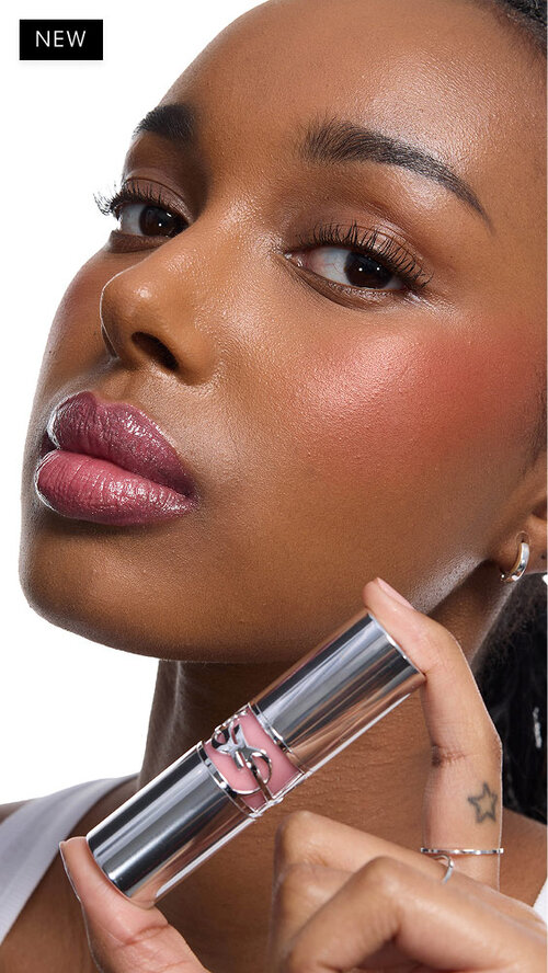 Najma, exuding confidence with YSL MAKE ME BLUSH Stardust Powder & Lipstick 12 & 215, product in hand.
