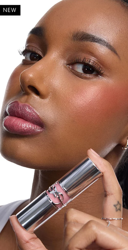 Najma, exuding confidence with YSL MAKE ME BLUSH Stardust Powder & Lipstick 12 & 215, product in hand.