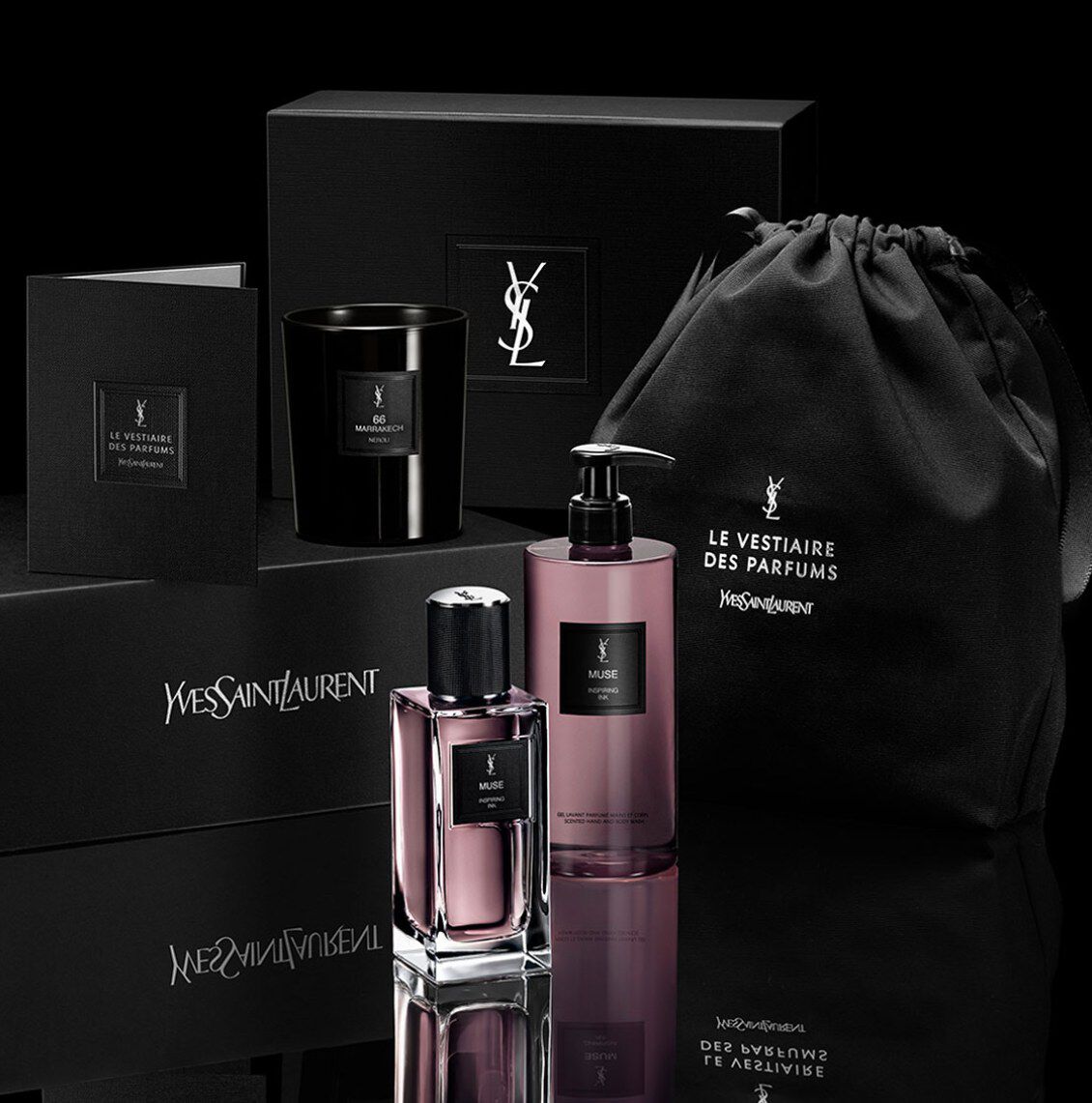 YSL Le Vestiaire Des Parfums collection: black box and a bag, Marrakech 66 candle, and Muse Eau de parfum and shower gel.