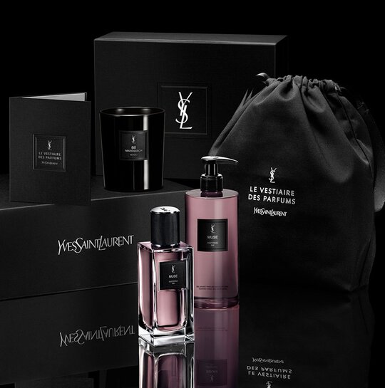 YSL Le Vestiaire Des Parfums collection: black box and a bag, Marrakech 66 candle, and Muse Eau de parfum and shower gel.