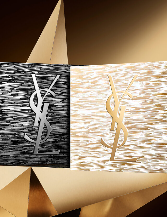 Holiday gift sets in black and gold with YSL logo, displayed on a golden star with a dark background.