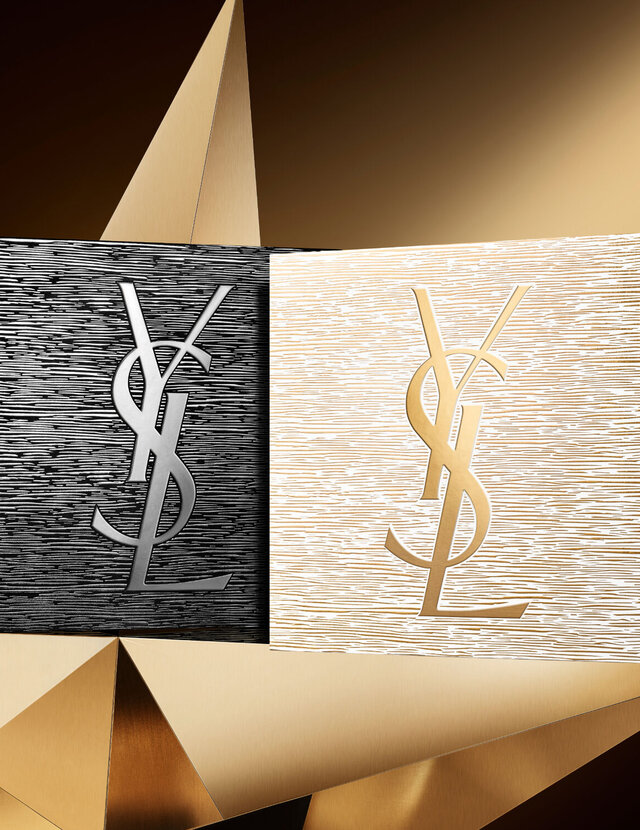 Holiday gift sets in black and gold with YSL logo, displayed on a golden star with a dark background.