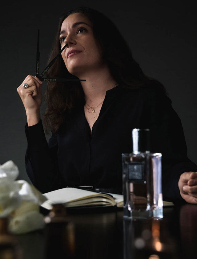 Master Perfumer Daniela Andrier in her studio with fragrance, evoking its creative process.