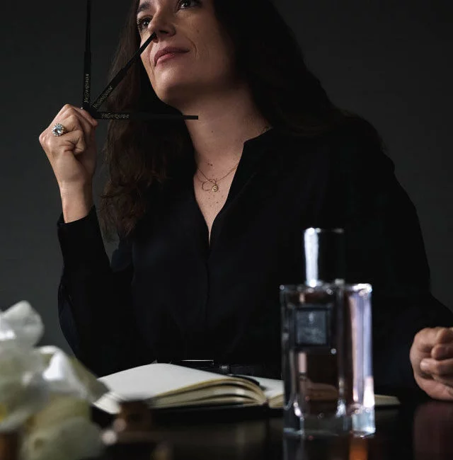 Master Perfumer Daniela Andrier in her studio with fragrance, evoking its creative process.