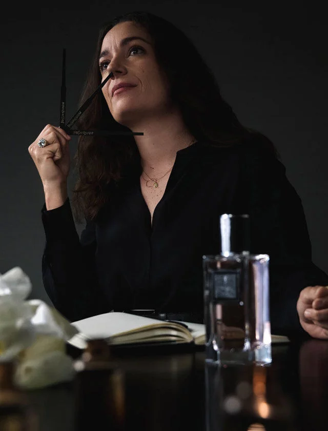 Master Perfumer Daniela Andrier in her studio with fragrance, evoking its creative process.