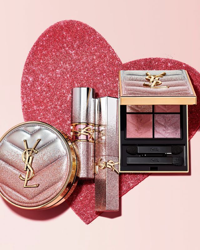 YSL Beauty Collector range featuring a cushion compact, lipsticks, and eyeshadow palette on a glittery heart background.