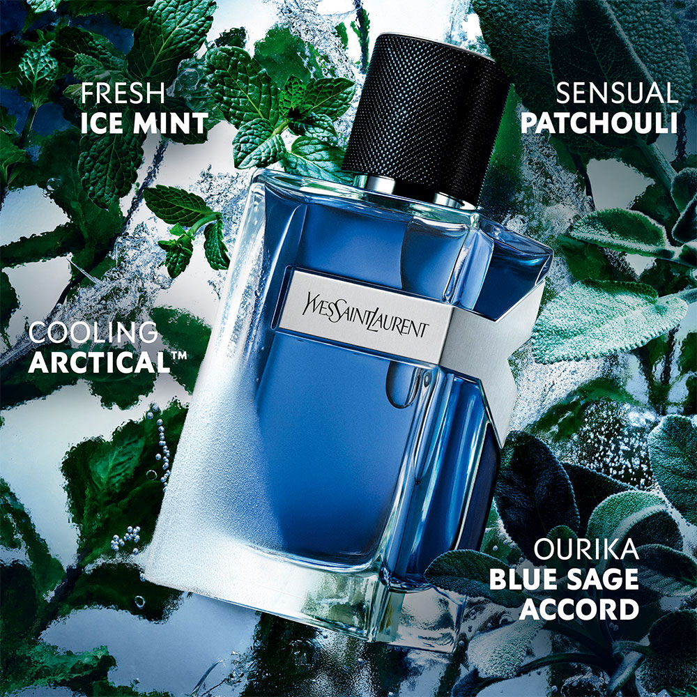 YSL Y Eau de Toilette Intense Iced Cologne bottle, with frosted glass, surrounded by vibrant mint leaves and icy water
