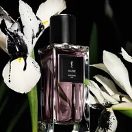YSL LVDP Muse Eau de Parfum bottle, elegantly presented with striking white and black irises in the background.