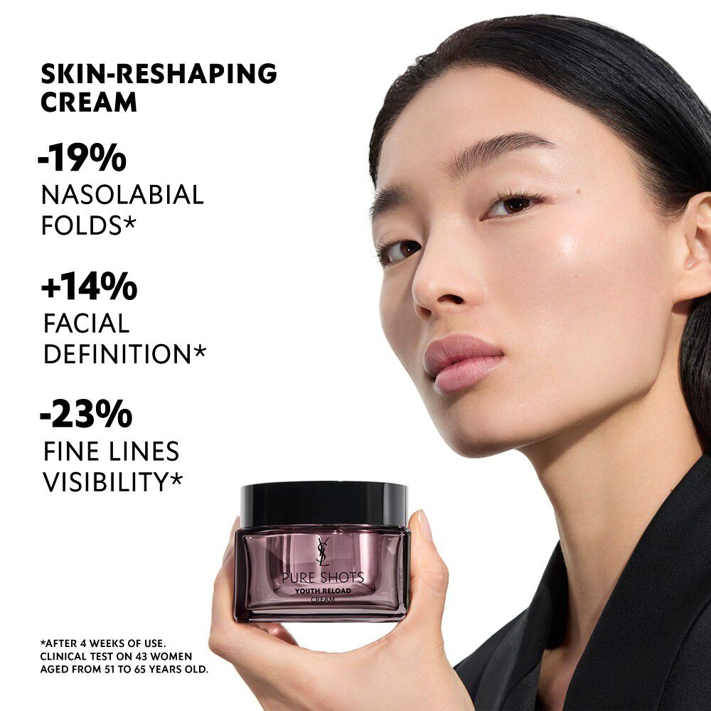 Wen, YSL Beauty model, holding Pure Shots Youth Reload cream, highlighting skin-reshaping claims.