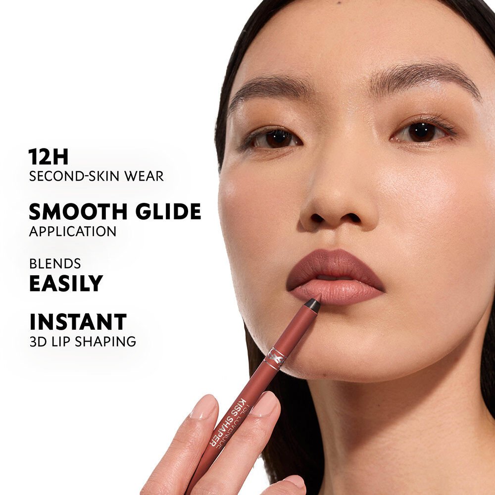 Model wearing YSL LOVENUDE KISS SHAPER with smooth matte nude lip finish.