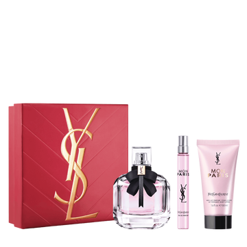 YSL Mon Paris Routine Spring Set with pink gift box, Mon Paris Eau de Parfum 90 ml, Mon Paris Eau de Parfum 10 ml and Mon Paris body lotion 50 ml on a white background.