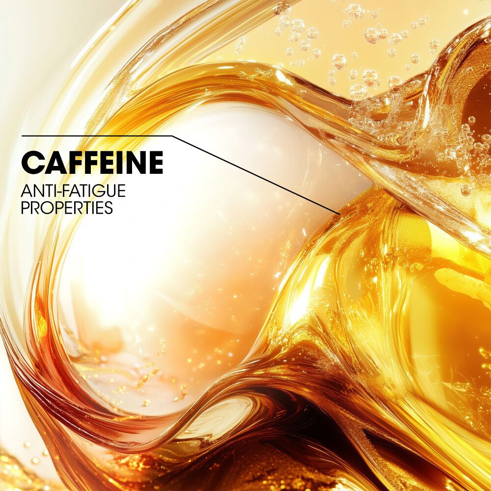 YSL Pure Shots Eye Reboot Cream ingredient spotlight: abstract golden liquid with bubbles, representing Caffeine Vitamin Complex.