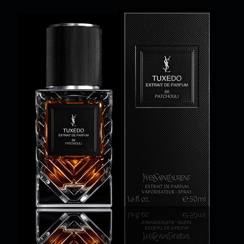 YSL LVDP Tuxedo Extrait de Parfum 66 Patchouli 50ml bottle and its elegant textured box on a black background.