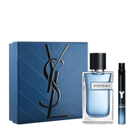 YSL Y Eau de Toilette Duo Spring Set with blue gift box, Y Eau de Toilette 100 ml bottle and 10 ml travel spray on a white background.