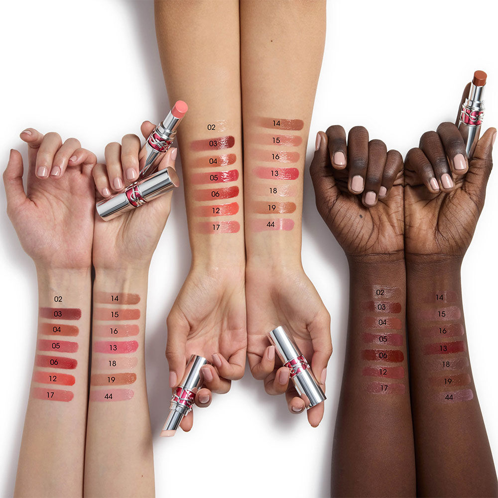 YSL LOVESHINE CANDY GLAZE lip gloss arm swatches displayed on multiple skin tones.