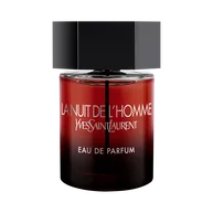The Bottle front-facing shot of the La Nuit de l’Homme Eau de Parfum bottle, featuring a deep red-to-black gradient glass and a signature matte black hexagonal cap.