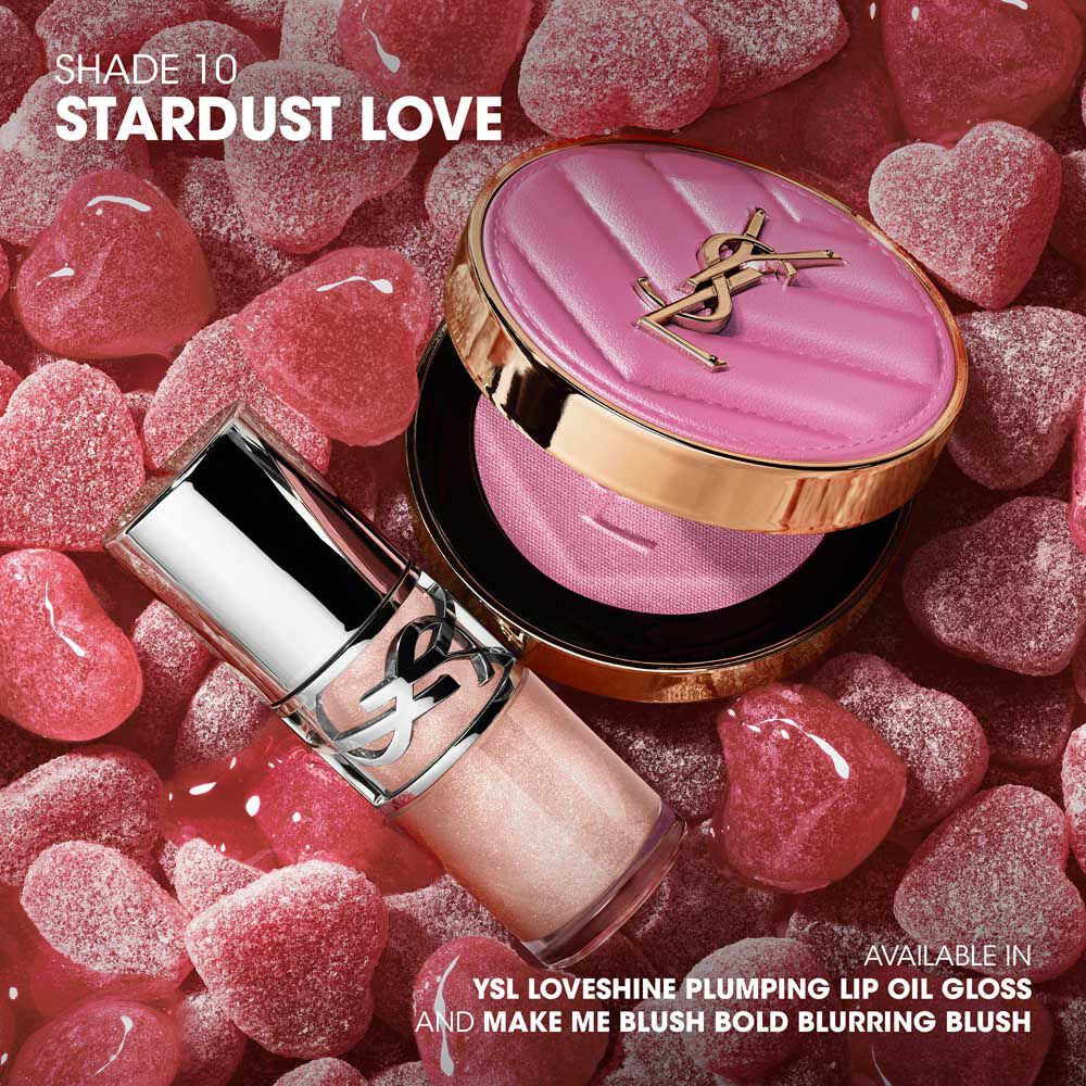 YSL Make Me Blush Powder Blush and LOVESHINE Plumping Lip Oil Gloss in shade 10, nestled among pink heart-shaped candies.
