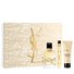 Holiday Gift Set in gold tones, closed; in front are Libre eau de parfum 50ml & 10ml and LIBRE Body Balm 50ml.