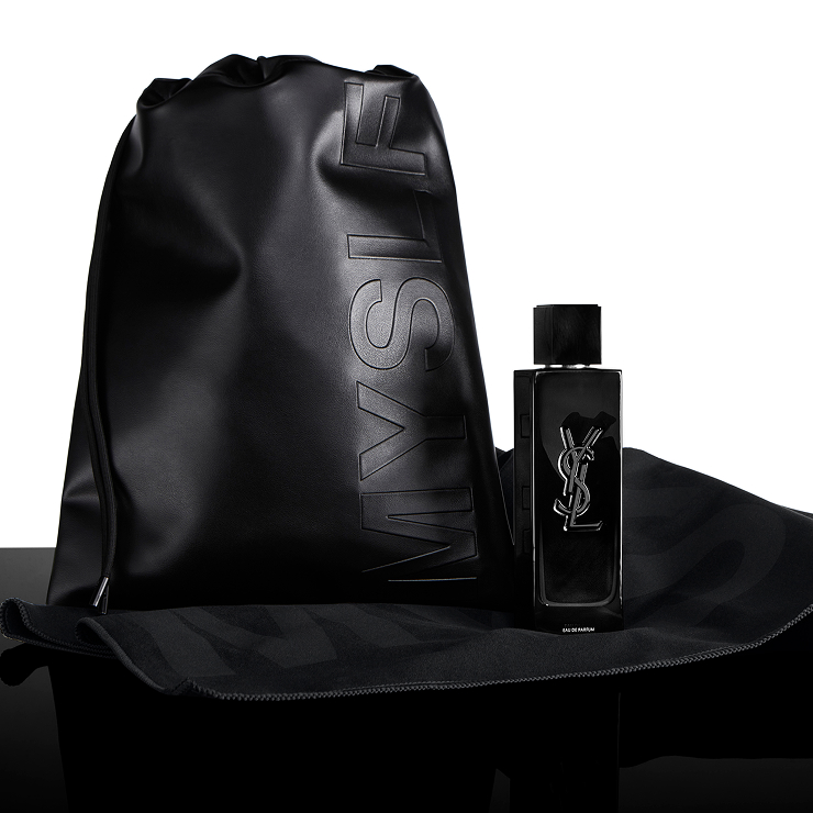 MYSLF Eau de Parfum bottle displayed next to an exclusive black MYSLF pouch for gifting.