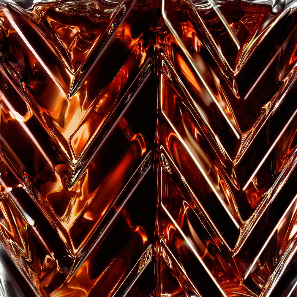 YSL Pure Shots Night Reboot Serum's bi-phase texture, showing two
distinct golden liquids with bubbles, for optimal efficacy.