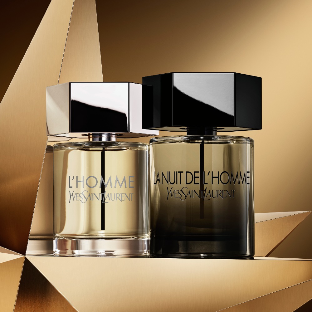 L'Homme eau de parfum bottle and la nuit de I'homme eau de parfum bottle on a golden background.