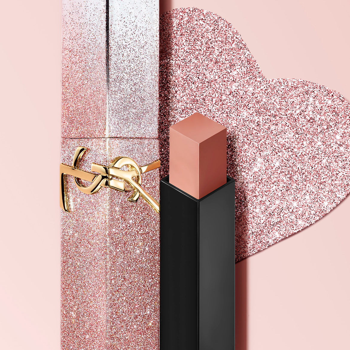 YSL Rouge Pur Couture The Slim Lipstick in a limited edition glitter case, with the bullet exposed, on a pink background.