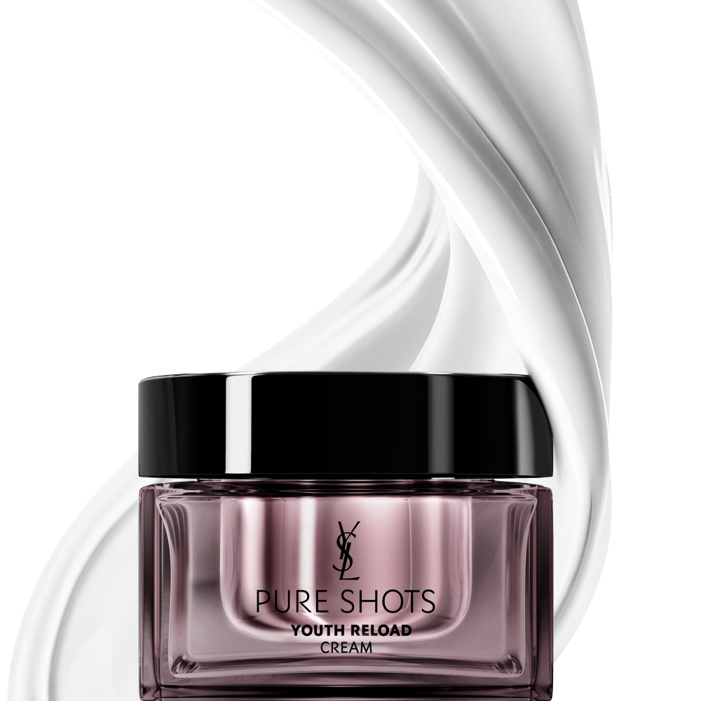 YSL Beauty Pure Shots Youth Reload cream jar, surrounded by a dynamic swirl of its luxurious texture.