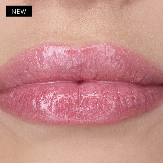 Nessie's fair skintone lips are adorned with YSL LOVESHINE Lipstick in shade 10 Stardust, a shimmering pink with a glossy finish.