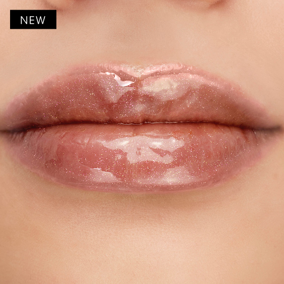 Close-up of medium-toned lips adorned with YSL LOVESHINE Plumping Gloss in Shade 1, highlighting its radiant, plumping effect.