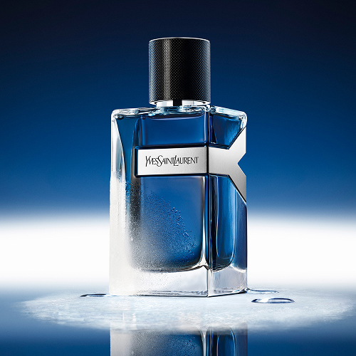 YSL Y Eau de Toilette Intense Iced Cologne 100ml bottle, frosted with 
water droplets, reflecting a cool blue ambiance.