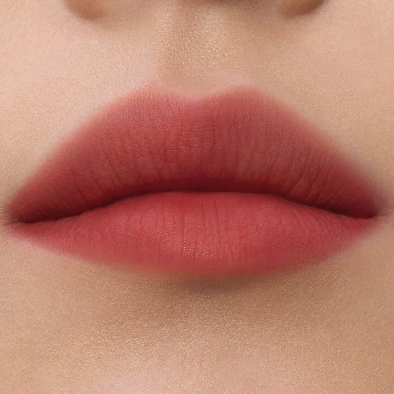 Close-up lip swatches of YSL smoked blur color stains in shades #238 Rose Call.