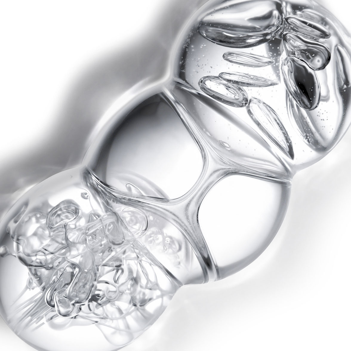 YSL Beauty Pure Shots Youth Reload complex, depicted as three interconnected, clear spheres.