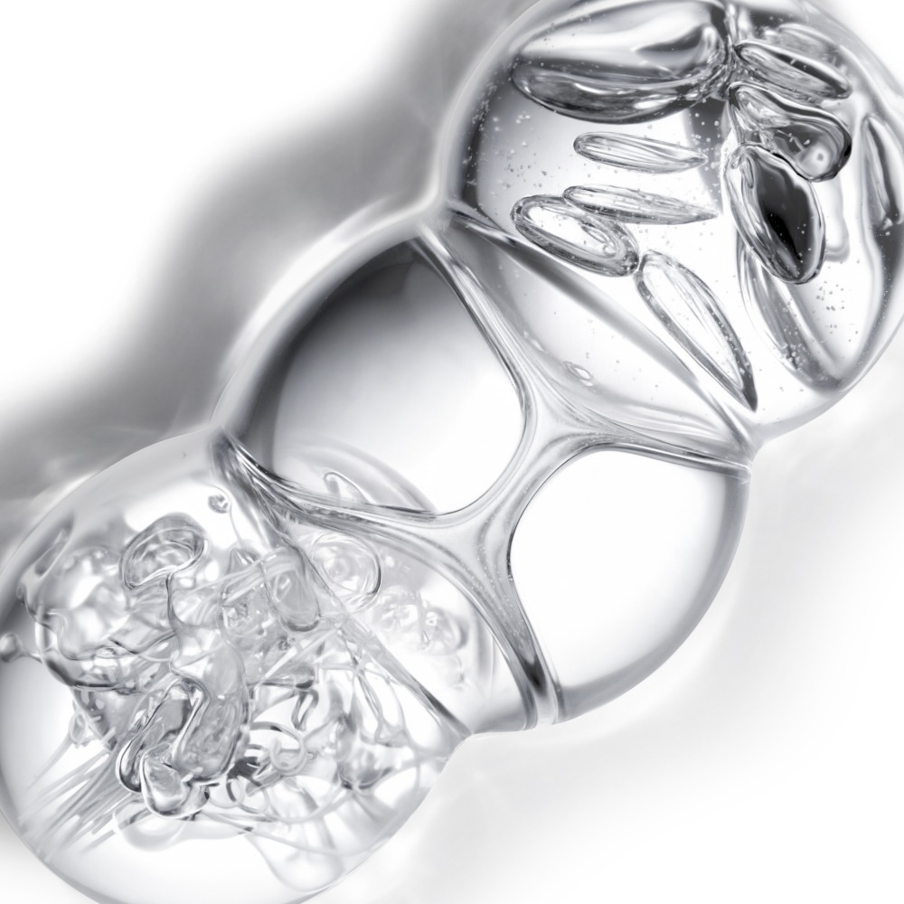 YSL Beauty Pure Shots Youth Reload complex, depicted as three interconnected, clear spheres.