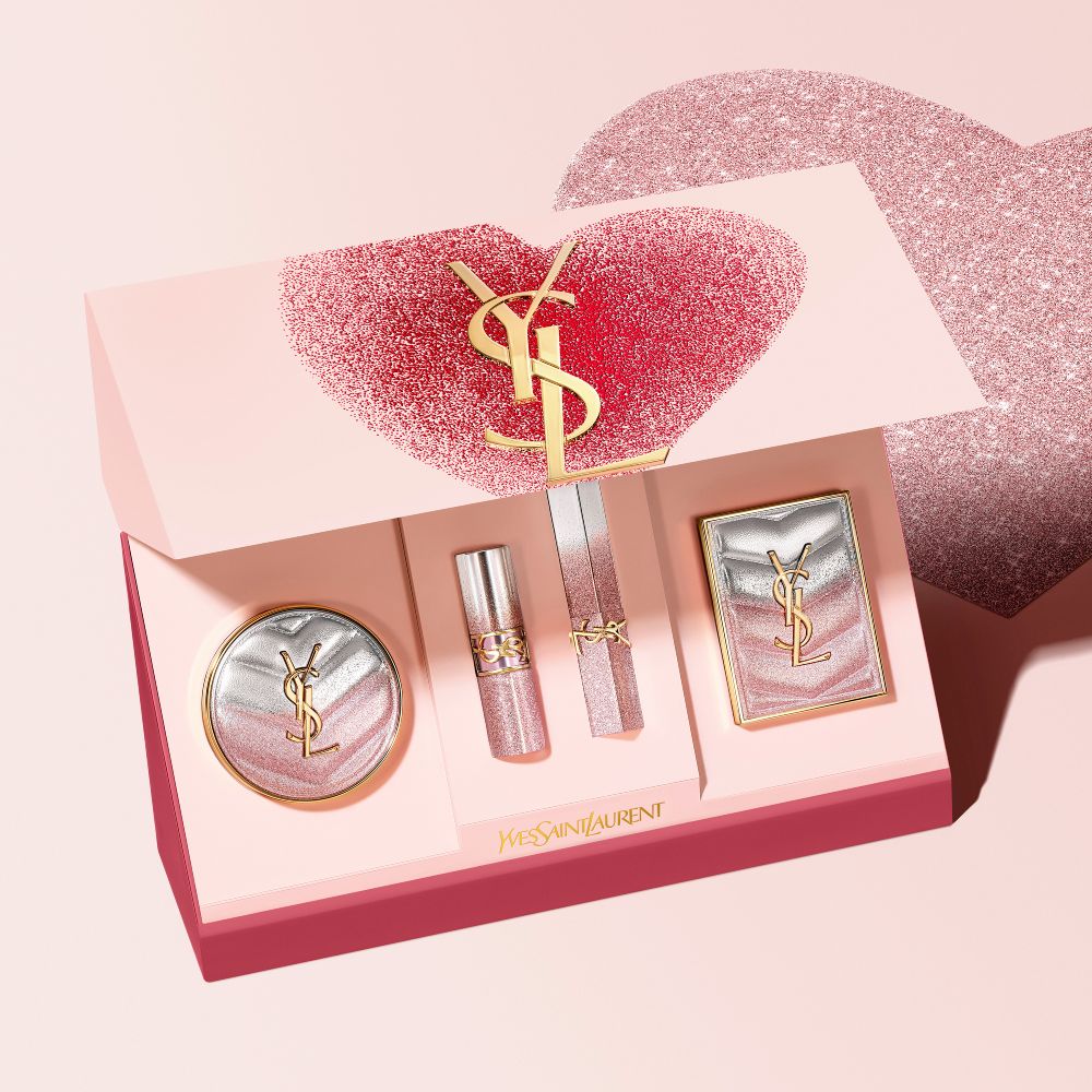 YSL Beauty Valentine's day makeup set in a heart-shaped box, featuring a cushion compact, lipstick, and eyeshadow palette.