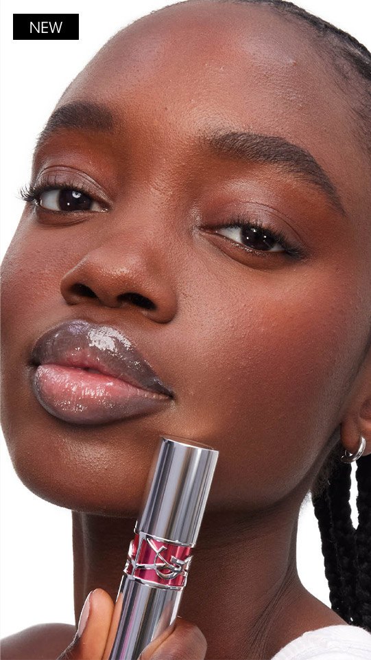 Model wearing YSL LOVESHINE CANDY GLAZE with glossy plumped lips.