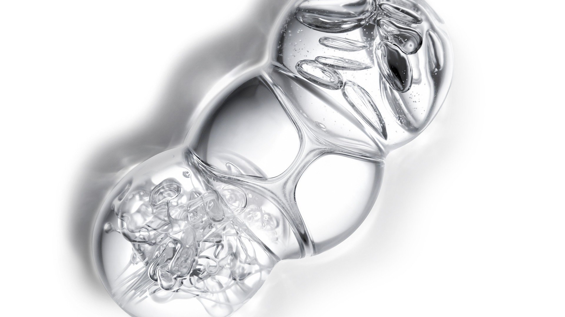 YSL Beauty Pure Shots Youth Reload complex, depicted as three interconnected, clear spheres.