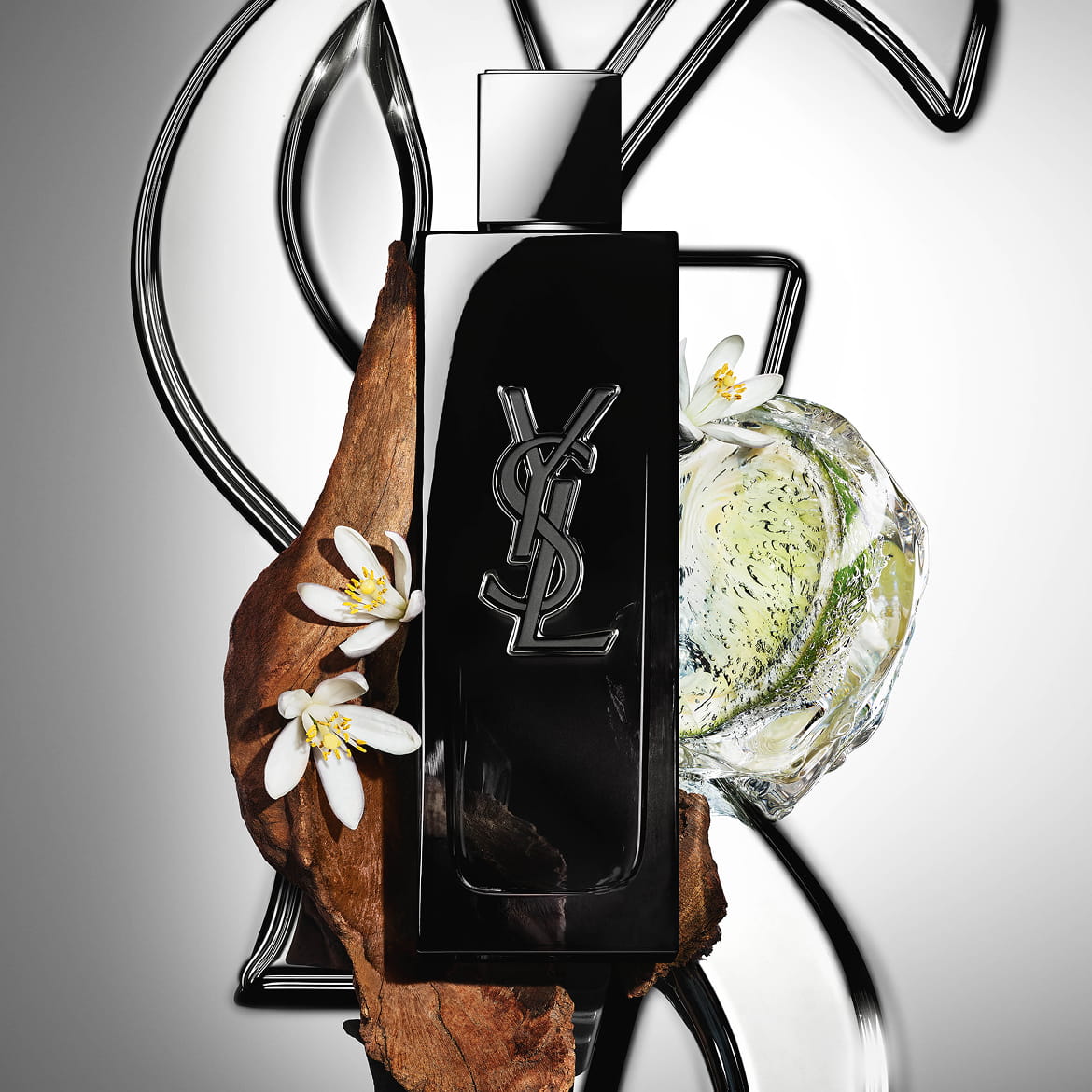 MYSLF Eau de Parfum bottle by YSL Beauty surrounded by fresh bergamot, orange blossom and
woods.
